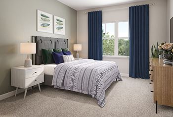 a bedroom with a bed and two windows with blue curtains